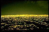 [Picture of lit-up
city.]
